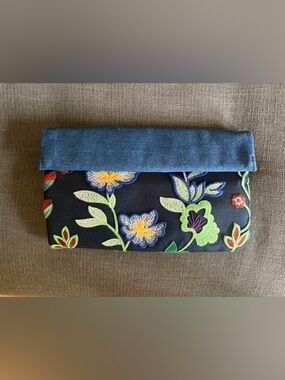 Embroidered denim clutch